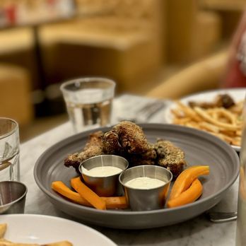 City Hall Bistro - Dry-rub lemon pepper wings - Modern European Near Me - Dallas, Texas City Hall Bistro - Dry-rub lemon pepper wings - Modern European Near Me - Dallas, Texas