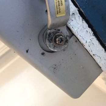 Major Key Locksmith - An old door closer. When you see oil and grease all over, it's time for a new closer. This had NO closing strength. - Keys & Locksmiths Near Me