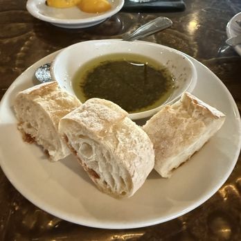 Cafe Murano - Table bread with olive oil, balsamic, and Parmesan - Italian Near Me - Altamonte Springs, Florida