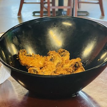 Hot Stone - a bowl of food on a table - Pizza Near Me - Wynne, Arkansas