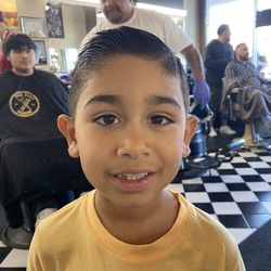Town Plaza Barbers - Vince cut his hair