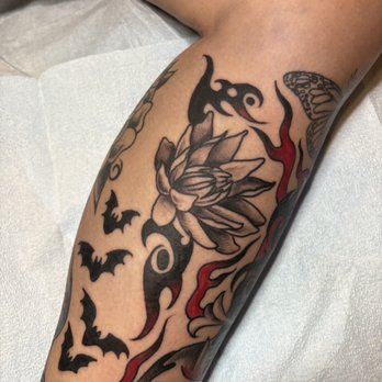 Tomorrow Tattoo - water lily and tribal - Tattoo Near Me - Athens, Georgia Tomorrow Tattoo - water lily and tribal - Tattoo Near Me - Athens, Georgia