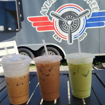 Aviation Coffee - From left to right: iced caramel latte, chocolate covered strawberries latte, iced matcha latte - Coffee & Tea Near Me - Brooksville, Florida
