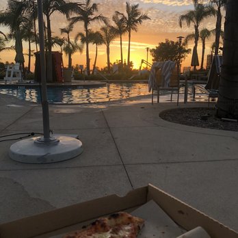 7 Mile Kitchen - Delicious sausage pizza from 7 Mile Kitchen by the pool - New American Near Me - Carlsbad, California