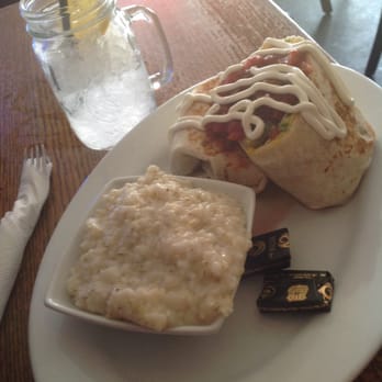 Lunch. Supper! - Pulled pork and egg burrito with  onions, peppers, salso and sourcream.... Plus REAL STONE GROUND GRITS!!! - New American Near Me - Richmond, Virginia
