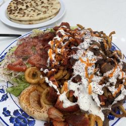 Falafel & Gyro - Massive portion, tastes soooo great and the owner gave us dessert for free!!