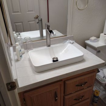 Montano's Granite - Guest bathroom countertop made from kitchen project remnant. - Countertop Installation Near Me Montano's Granite - Guest bathroom countertop made from kitchen project remnant. - Countertop Installation Near Me