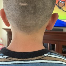 Park Row Barber Shop - Not square at bottom uneven terrible haircuts