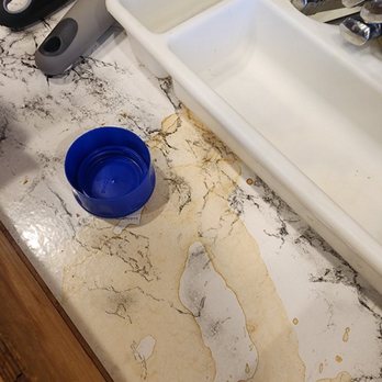 Big Bear Vacations - What is this nasty stain! And opened bottle cap inside kitchen cabinet! - Vacation Rentals Near Me - Big Bear Lake, California