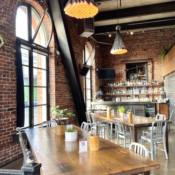 Basil Canteen - Communal tables as you enter - interior is very inviting - Thai Near Me - San Francisco, California Basil Canteen - Communal tables as you enter - interior is very inviting - Thai Near Me - San Francisco, California