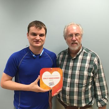 Shreveport Security Systems - Owner, Benjamin Simmons (left), and Salesman, Greg Farrier, being presented with the 2016/17 Locals Love Us Award - Security Systems Near Me - Shreveport, Louisiana Shreveport Security Systems - Owner, Benjamin Simmons (left), and Salesman, Greg Farrier, being presented with the 2016/17 Locals Love Us Award - Security Systems Near Me - Shreveport, Louisiana