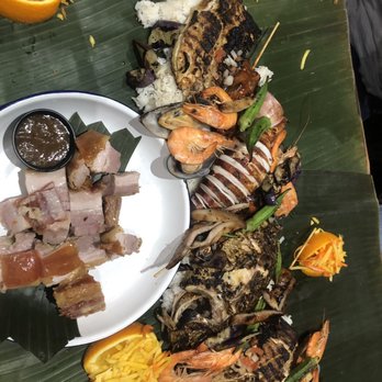 Tinuno - Kamayan feast for 4 plus a side of lechon - Filipino Near Me - Toronto, Ontario Tinuno - Kamayan feast for 4 plus a side of lechon - Filipino Near Me - Toronto, Ontario