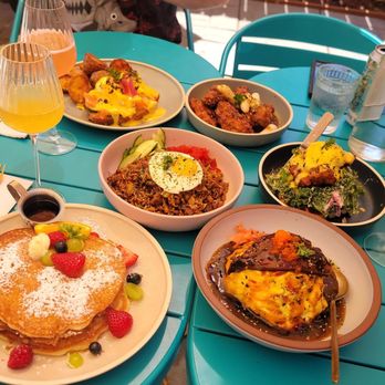Sunny Side Breakfast - Yuzu benedict, wings, jjapaguri, croffle, omurice, ricotta pancakes, peach mimosa, raspberry mimosa, passion fruit mimosa (unpuctured here) - Breakfast & Brunch Near Me - Sacramento, California Sunny Side Breakfast - Yuzu benedict, wings, jjapaguri, croffle, omurice, ricotta pancakes, peach mimosa, raspberry mimosa, passion fruit mimosa (unpuctured here) - Breakfast & Brunch Near Me - Sacramento, California
