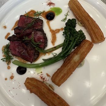 Le Jardinier - Waygu bavette au jus, turnip & horseradish, black garlic and broccolini - French Near Me - Houston, Texas Le Jardinier - Waygu bavette au jus, turnip & horseradish, black garlic and broccolini - French Near Me - Houston, Texas