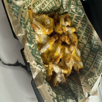 Wingstop - Large Voodoo fries - Chicken Wings Near Me - Royal Palm Beach, Florida Wingstop - Large Voodoo fries - Chicken Wings Near Me - Royal Palm Beach, Florida
