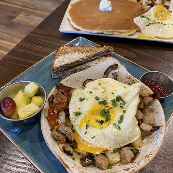 First Watch - Parma skillet hash and Trifecta in the back. - Breakfast & Brunch Near Me - Austin, Texas