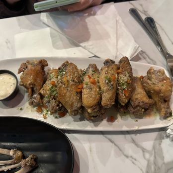 Illusive Restaurant & Bar - Garlic parm wings - American Near Me - Rensselaer, New York Illusive Restaurant & Bar - Garlic parm wings - American Near Me - Rensselaer, New York