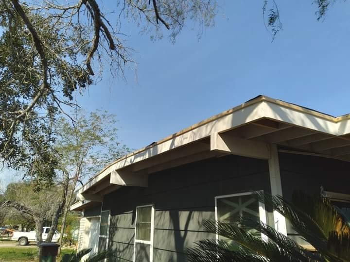 Slide of Bert's Roofing