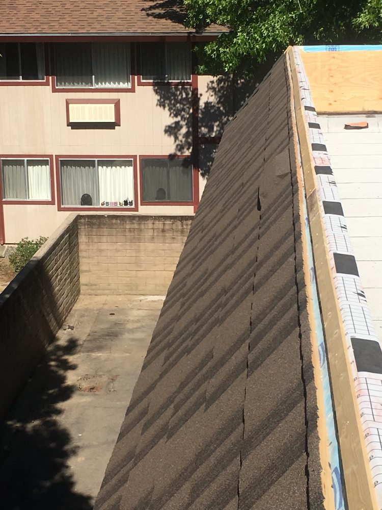 Slide of At the Top Roofing