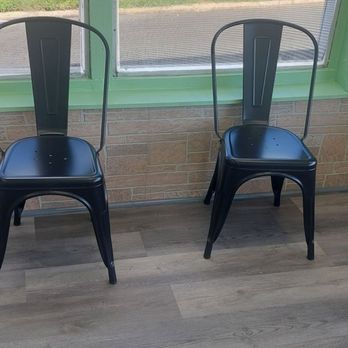 Cheesesteak Mikes - two chairs in front of a window - Burgers Near Me - Silver Spring, Maryland
