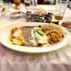 Superior Grill Highland - Lunch Special: Cheese and Beef Enchiladas with a Taco.