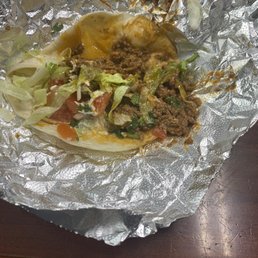 Some sort of mystery meat and grease taco