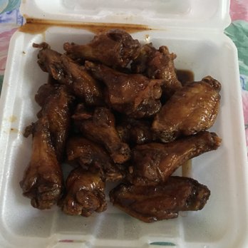 Pluckers Wing Bar - Oak Hill - Jamaican mango wings - Chicken Wings Near Me - Austin, Texas