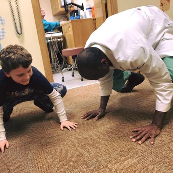 Katahdin Pediatric Dentistry - Dr. T is not afraid of a Yoga Challenge with his patients! - Pediatric Dentists Near Me - Bangor, Maine Katahdin Pediatric Dentistry - Dr. T is not afraid of a Yoga Challenge with his patients! - Pediatric Dentists Near Me - Bangor, Maine