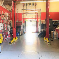Auto 1 Service Center - Top Of The Line Rotary Lifts  Drive-Thru Oil Changer 2 Bays