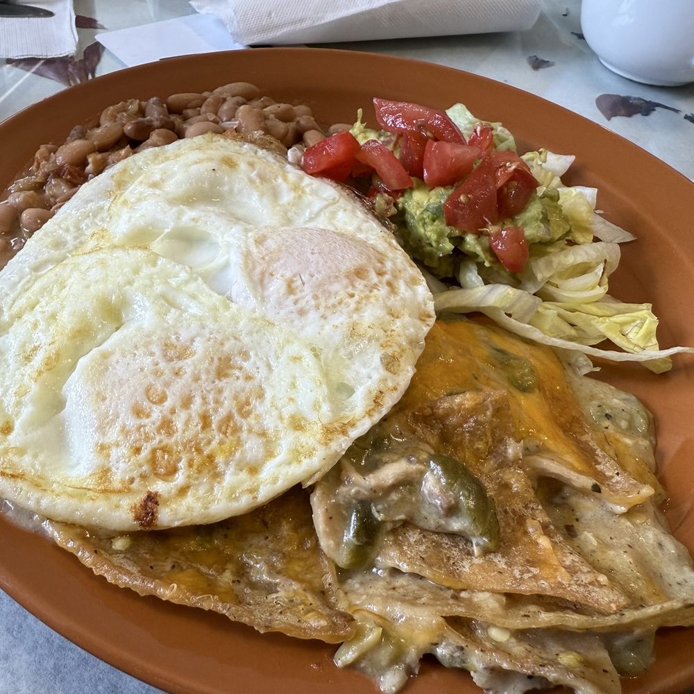 The Chancla ABQ - Creamy chicken chilaquiles with over medium eggs - Breakfast & Brunch Near Me - Albuquerque, New Mexico The Chancla ABQ - Creamy chicken chilaquiles with over medium eggs - Breakfast & Brunch Near Me - Albuquerque, New Mexico