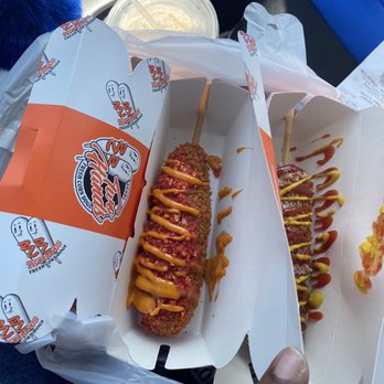 Two Hands Corn Dog - Spicy Dog (half sausage half mozzarella) - Fast Food Near Me - Grand Prairie, Texas Two Hands Corn Dog - Spicy Dog (half sausage half mozzarella) - Fast Food Near Me - Grand Prairie, Texas