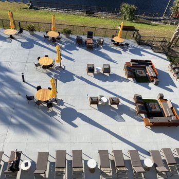 Four Points by Sheraton Myrtle Beach - the pool  lounge area - Hotels Near Me - Myrtle Beach, South Carolina