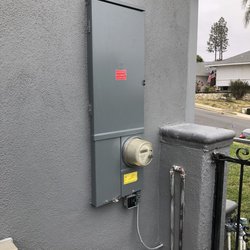 RM Electric Service - New upgraded 200 amp panel required for new ACPro system. Related stucco & painting work to make the area look like new.