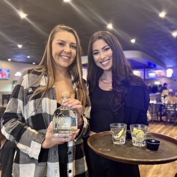 Brew & Barrel Tavern - two women holding drinks - American Near Me - Jacksonville, Florida