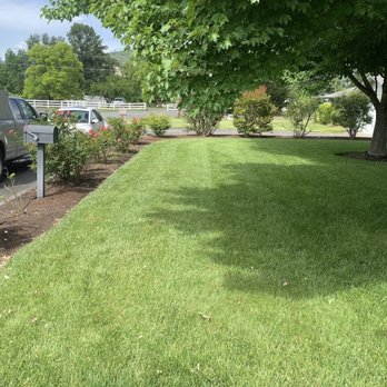Kruse Control Yard Care - a truck parked in the yard - Lawn Services Near Me