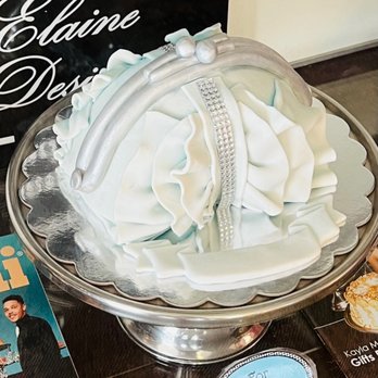 Pound By Legacy Cakes - a cake on display - Bakeries Near Me - Greensboro, North Carolina Pound By Legacy Cakes - a cake on display - Bakeries Near Me - Greensboro, North Carolina