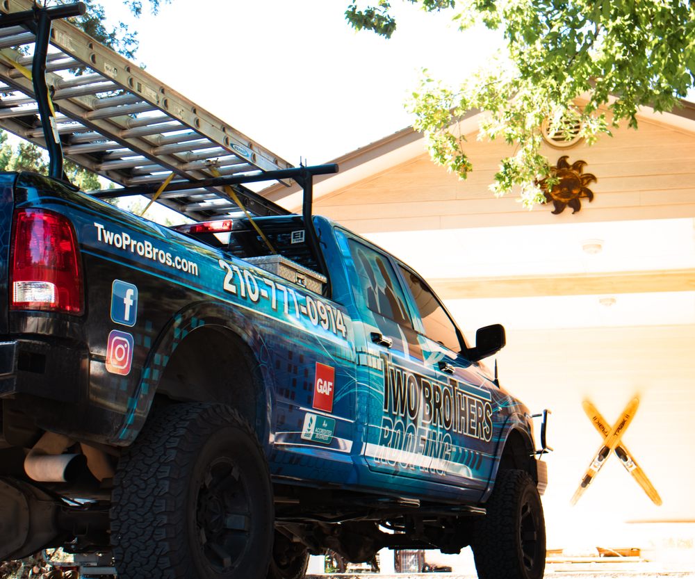 Slide of Two Brothers Roofing