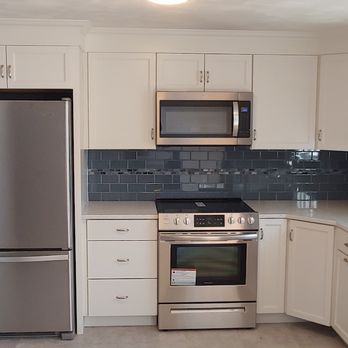 Innovative Home Transformations - kitchen with stainless steel appliances - General Contractors Near Me Innovative Home Transformations - kitchen with stainless steel appliances - General Contractors Near Me