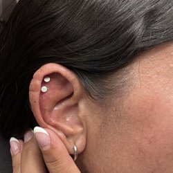 Maritime Tattoo - This is after I got it fixed. Over an hour after I got the jewelry cut off and you can still see the indents. That's how tight she had them.