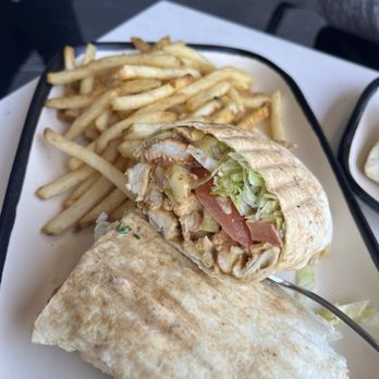Meddys - Succulent chicken wrap and the fries!! Probably both of these were our favorites! - Mediterranean Near Me - Omaha, Nebraska Meddys - Succulent chicken wrap and the fries!! Probably both of these were our favorites! - Mediterranean Near Me - Omaha, Nebraska