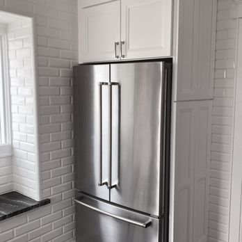 Ribo Construction - Fridge enclosure with full wall tiling - General Contractors Near Me - Saddle Brook, New Jersey