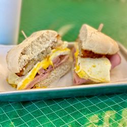 Bodi's Bake Shop - The Haystacker with Ham + Egg, Cheese, Potato Pancake and Sour Cream. An amazing sandwich!!