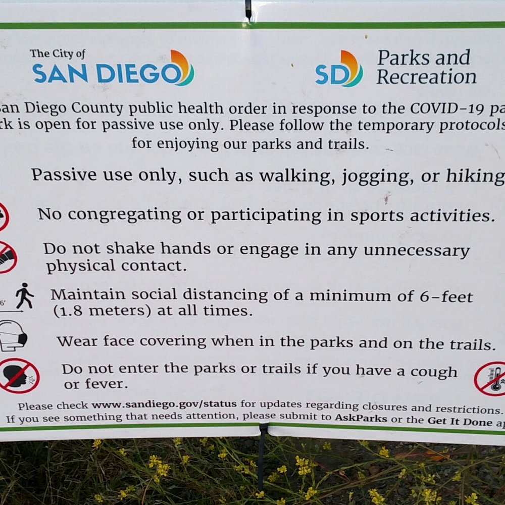 Lopez Canyon - List of COVID-19 precautions mounted on a gate - Hiking Near Me - San Diego, California