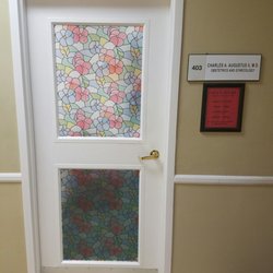 Augustus Charles, MD - Entry on fourth floor.