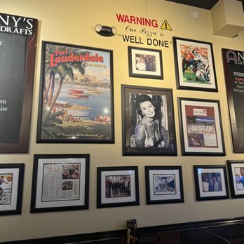 Anthony's Coal Fired Pizza & Wings - Historical wall with photos of the owner and celebrities - Pizza Near Me - Wantagh, New York