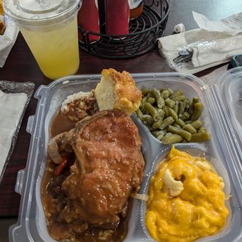 Li'l Dizzy's Cafe - Smothered Pork Chops - Cajun/Creole Near Me - New Orleans, Louisiana Li'l Dizzy's Cafe - Smothered Pork Chops - Cajun/Creole Near Me - New Orleans, Louisiana