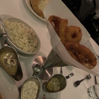 Morton's The Steakhouse - Sour Cream Mashed Potatoes, Onion Rings with black truffle aioli (white sauce) - Steakhouses Near Me - Hackensack, New Jersey