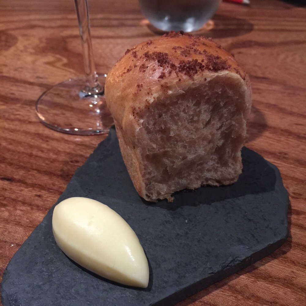 Lazy Bear - Spelt & Rye Dinner Roll with ln-House Cultured Butter - New American Near Me - San Francisco, California Lazy Bear - Spelt & Rye Dinner Roll with ln-House Cultured Butter - New American Near Me - San Francisco, California