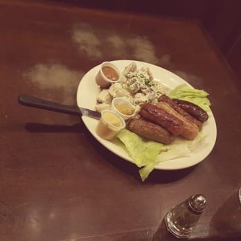 Schnitzel Haus - Wurst sampler with red potato salad. - German Near Me - Brooklyn, New York Schnitzel Haus - Wurst sampler with red potato salad. - German Near Me - Brooklyn, New York