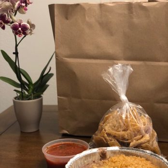 Texican Cafe - beef enchiladas with rice and refried beans and fresh chips with a great flavorful salsa - Mexican Near Me - Kyle, Texas